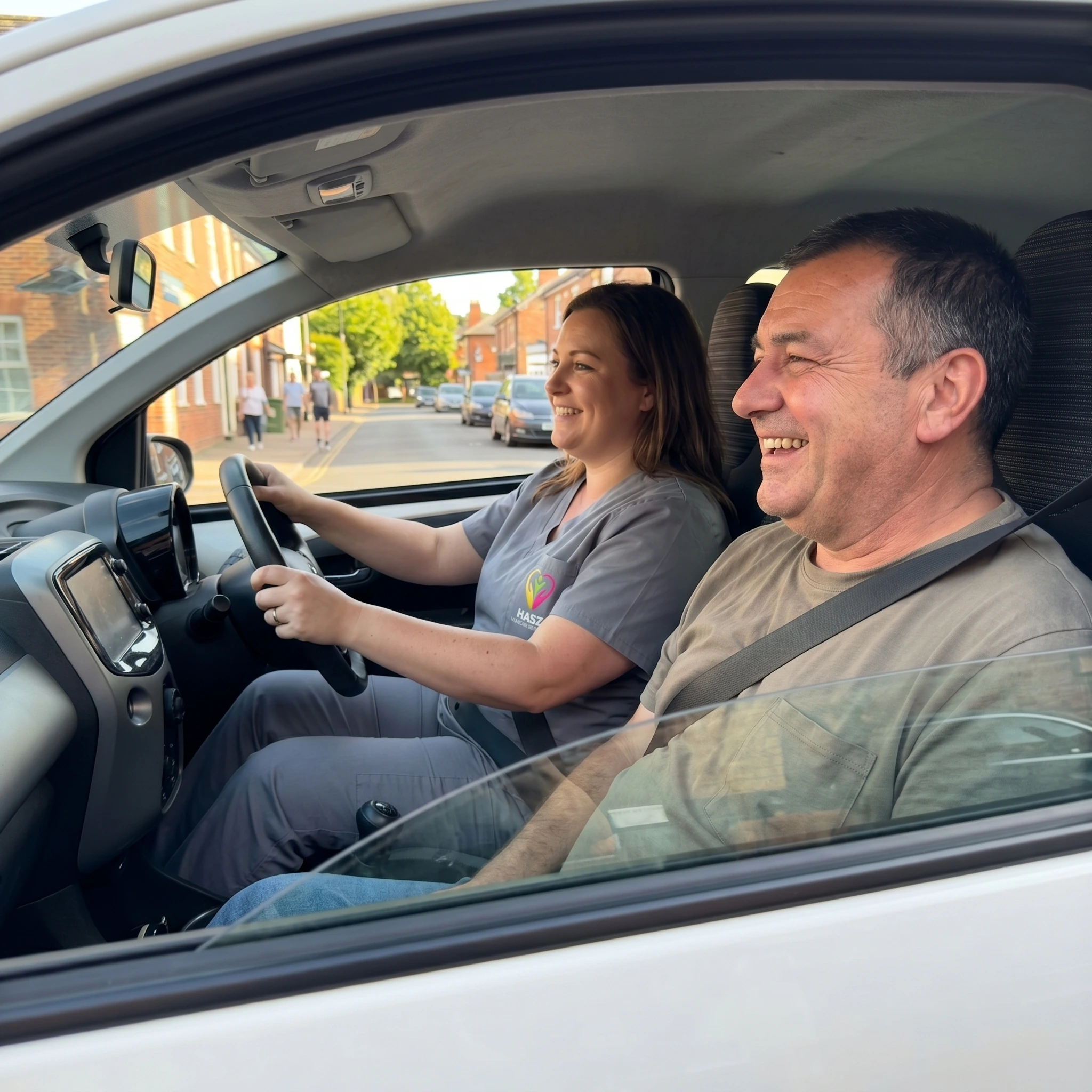 Hasz Homecare Services transport assistant loading wheelchair user into accessible vehicle
